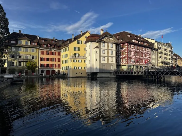 Houses by dam in Lucerne, Switzerland