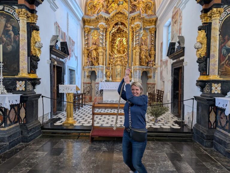 Ringing wishing bell in Church of Assumption, Bled Island